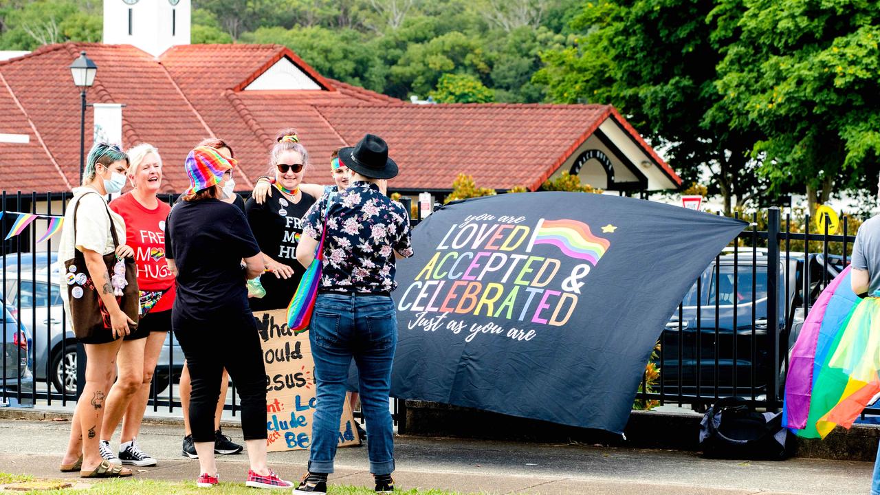 Protesters gather outside Citipointe Christian College. Picture: Richard Walker