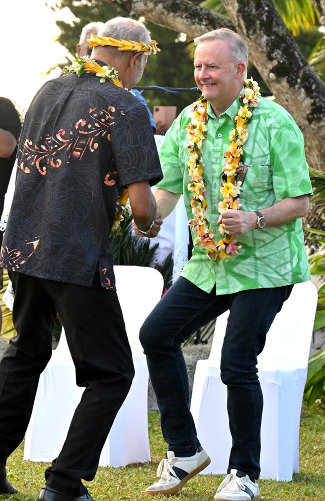 Prime Minister Anthony Albanese dances before receiving a gift during a welcome ceremony the Pacific Islands Forum in Aitutaki, Cook Islands. Picture: Mick Tsikas/AAP