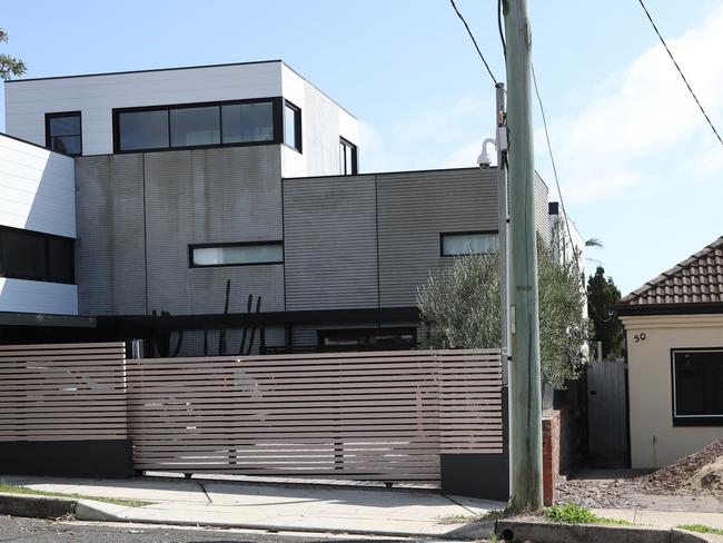 Guy Sebastian’s house on the left, and neighbour Phillip Hanslow’s residence on the right. Picture: John Grainger