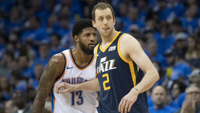 Australian Joe Ingles of the Utah Jazz defends against Paul George of the Oklahoma City Thunder in game one of the NBA Western Conference playoffs