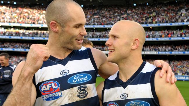 Tom Harley and Gary Ablett after the Cats’ 2009 premiership win.