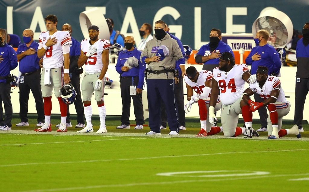 Members of the New York Giants kneel during the US national anthem in 2020, a form of protest slammed by Donald Trump in the past