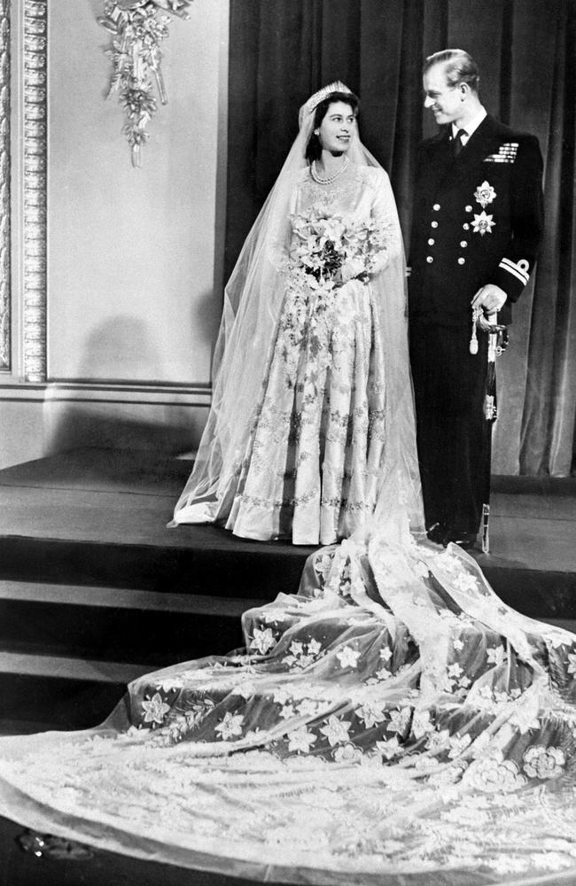 The couple on their wedding day in 1947. Picture: AFP PHOTO / STR