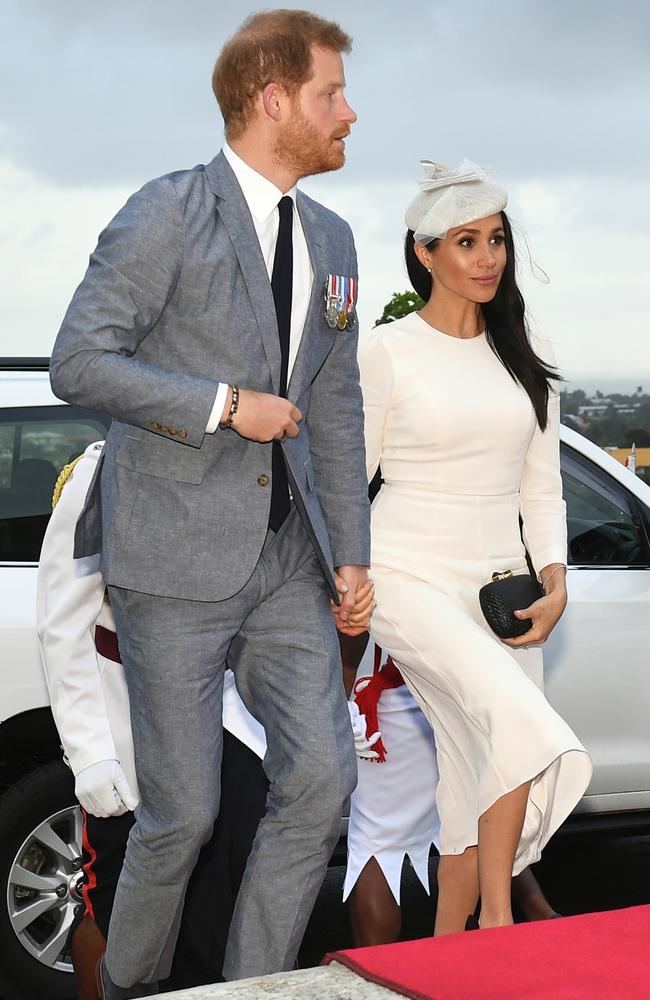 Prince Harry pictured with Meghan, the Duchess of Sussex, in Fiji, where she wore Australian designer, Zimmermann. Picture: Getty Images