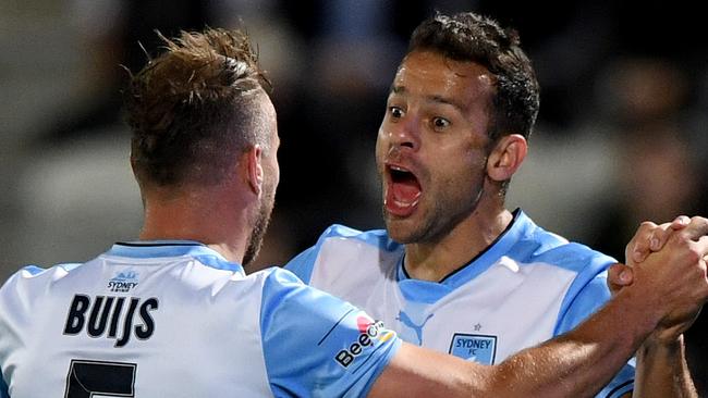 Sydney FC striker Bobo (right) celebrates with teammate Jordy Buiys after he scored against South Melbourne on Wednesday night.