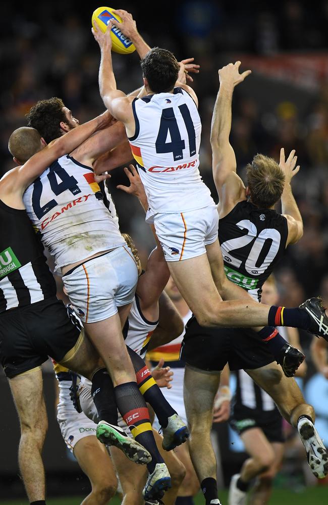 Mitch McGovern marks in the dying seconds. Picture: AAP