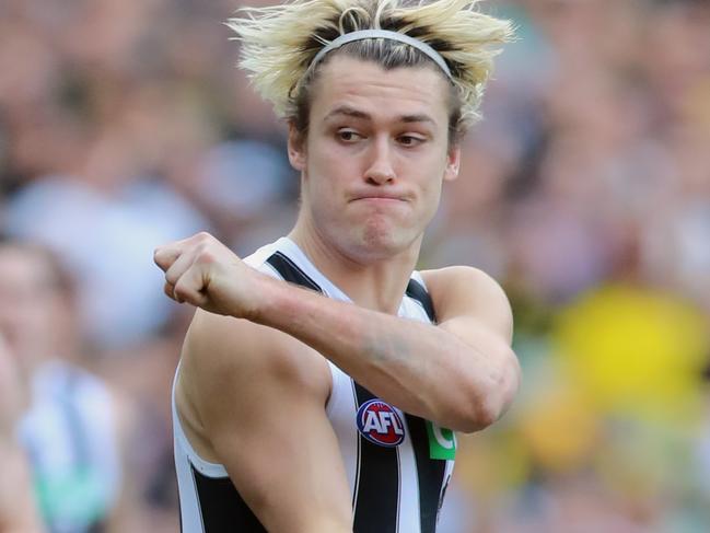 Richmond Vs. Collingwood at the MCG for round 19 of the AFL.  Liam Baker tackles Darcy Moore. Picture: Alex Coppel