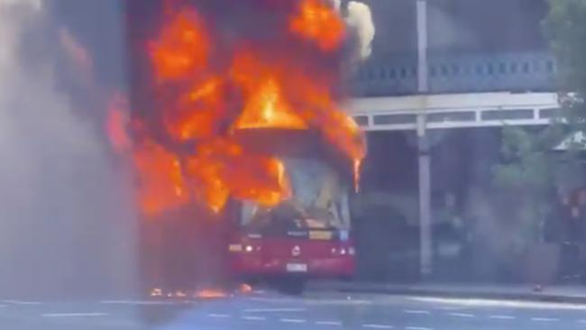 A bus on fire at thw corner of Glebe point Rd and Broadway in Glebe on Monday night. Picture: https://twitter.com/CSWherrett/status/1348525772147806210