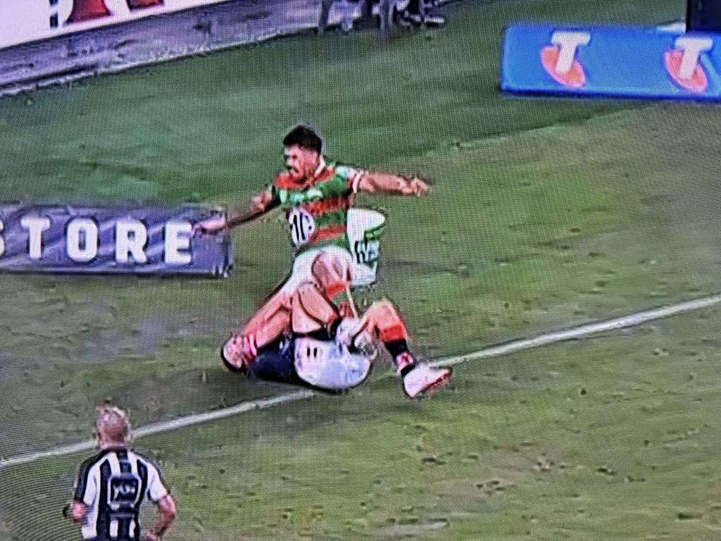 Latrell Mitchell makes contact with the knees to the face of James Tedesco. Pic: Fox League