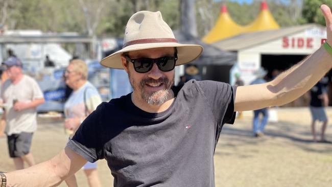 John Lansbury, from Brisbane, enjoys day one of the 2024 Gympie Muster, at the Amamoor State Forest on August 22, 2024.