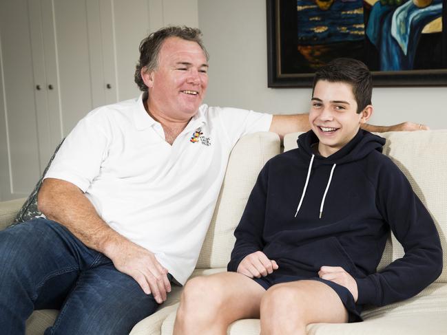 12-year-old cancer patient Hugo Kulscar with Wallabies legend Owen Finegan. Picture: Dylan Robinson