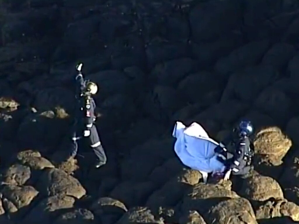 Paramedics at the scene on Saturday afternoon. Picture: 7 News