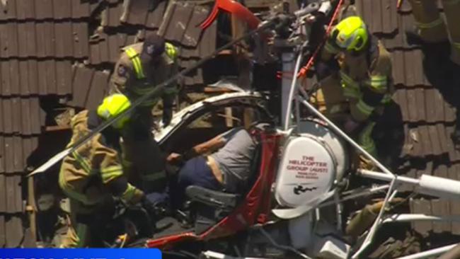 The pilot was trapped in the wreckage. Picture: Nine News