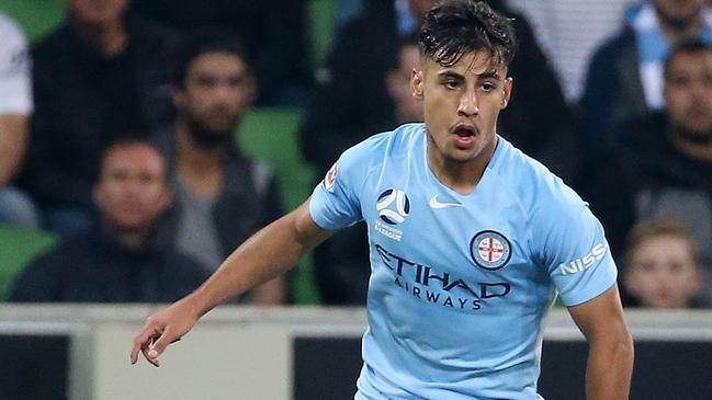 A-League elimination final. 20/04/2018. Melbourne City v Brisbane Roar at AAMI Park, Melbourne. Melbourne City's Daniel Arzani gets around Ivan Franjic of the Brisbane Roar. Pic: Michael Klein