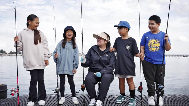 The wharves have become popular among fishing enthusiasts including Alexa Quiazon, Kate Alvarez, Marita Quiazon, Mason Quiazon and Jackson Grant. Picture: Sam Ruttyn
