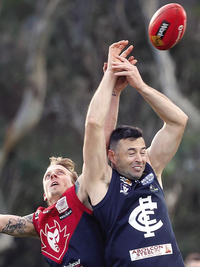 Corryong utility Tom Saunders, left, spoils Cudgewa's Josh Bartel. Picture: Corryong Courier