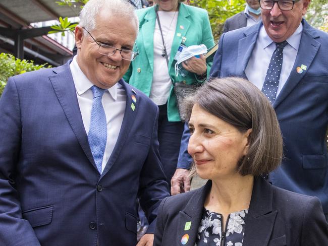 SYDNEY, AUSTRALIA - FEBRUARY 19: Australian Prime Minister Scott Morrison, NSW Premier Gladys Berejiklian and NSW Minister for Health and Medical Research Brad Hazzard (R) depart after speaking at a press conference on February 19, 2021 in Sydney, Australia. Royal Prince Alfred Hospital is one 16 vaccination hubs in New South Wales that will begin to inoculate frontline workers as Australia rolls out it's Covid-19 vaccination plan from Monday, February 22. (Photo by Jenny Evans/Getty Images)