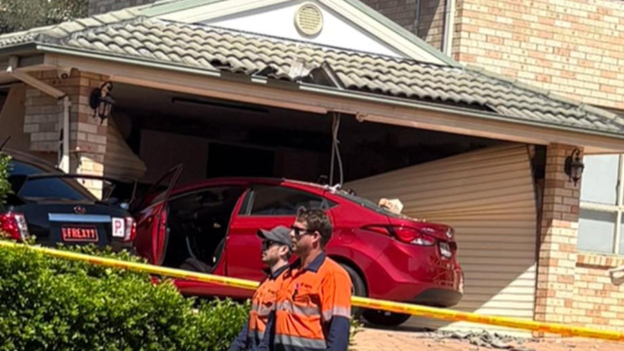 Elderly women injured after car crashes into Sydney home