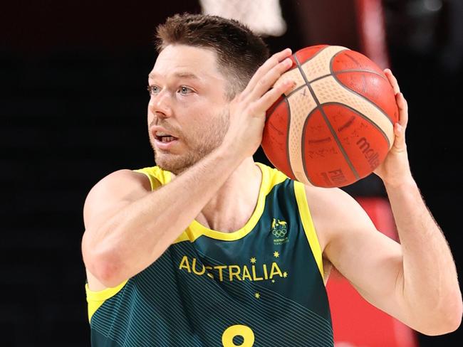 SAITAMA, JAPAN - JULY 28: Matthew Dellavedova #8 of Team Australia looks to pass against Italy during the second half of a Men's Preliminary Round Group B game on day five of the Tokyo 2020 Olympic Games at Saitama Super Arena on July 28, 2021 in Saitama, Japan. (Photo by Gregory Shamus/Getty Images)