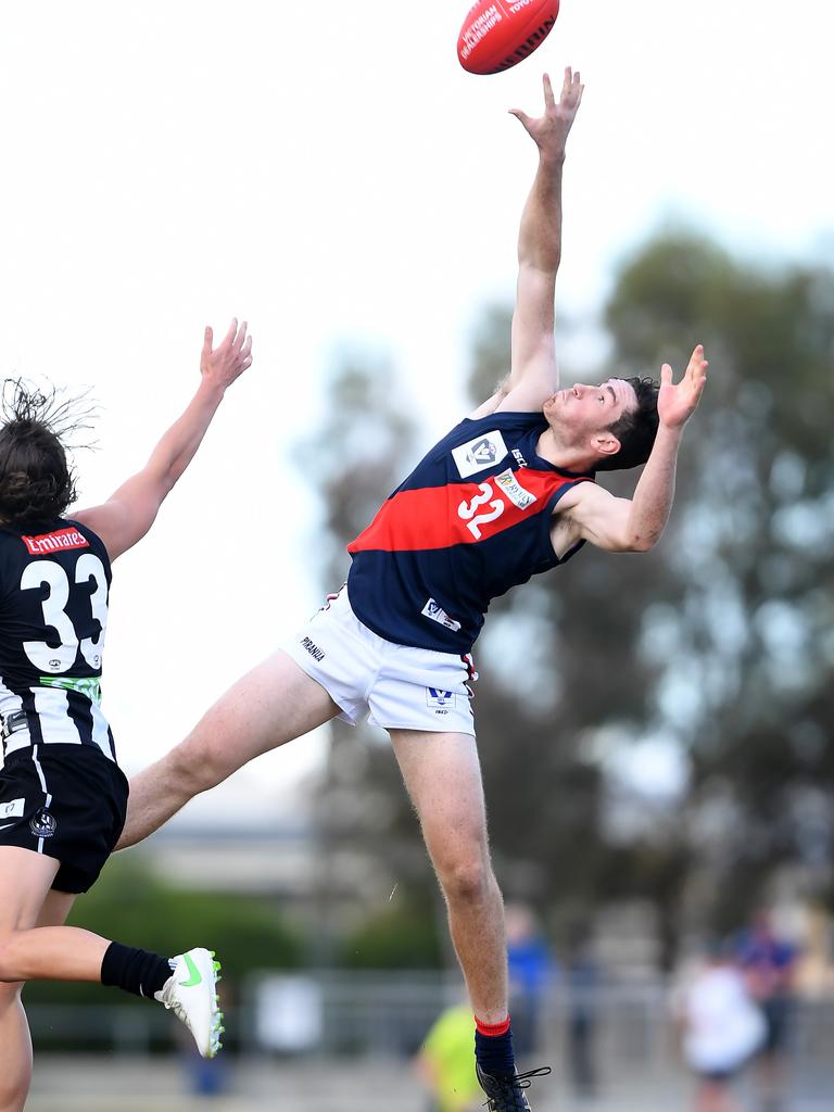 VFL: Jackson Davies juggles the ball in Coburg’s clash with Collingwood. Picture: Andy Brownbill