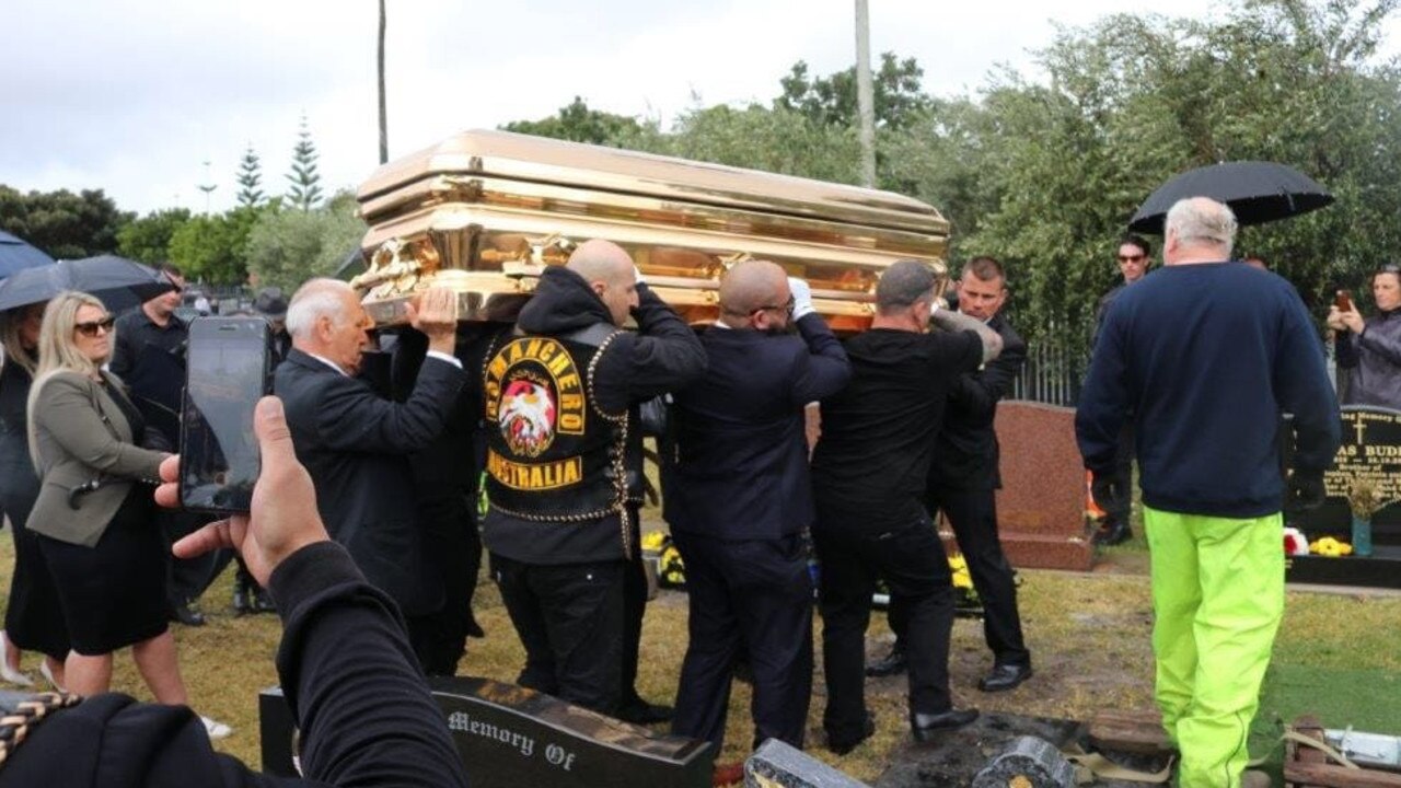 Mark Buddle's mother's $45,000 coffin being carried at her funeral. Picture: Supplied