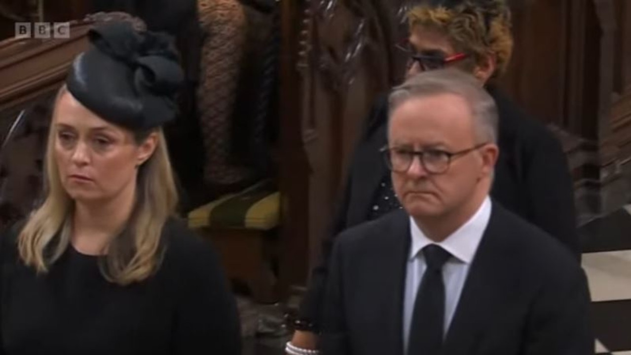 Anthony Albanese and partner Jodie Haydon entering the chapel.