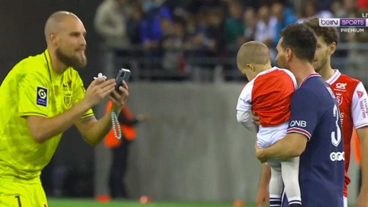 Messi with Rajkovic's son. Photo: BeIN Sports