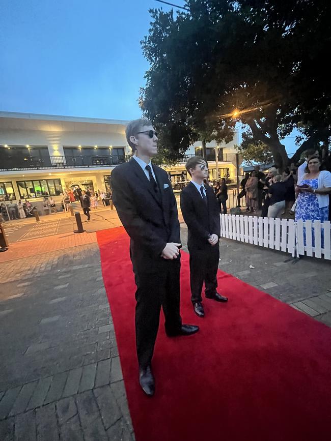 The students of Urangan State High School arrive at their formal.