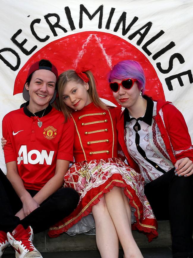 Rebecca, Skye and Renee at a sex workers rally on the steps of Parliament House earlier this year. Picture: Simon Cross