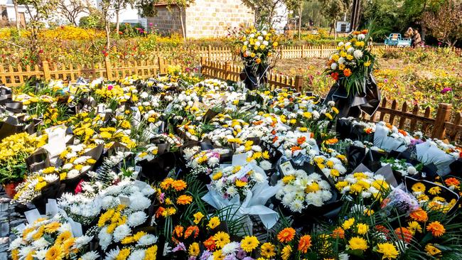 Flowers left at a place where former Chinese premier Li Keqiang used to work at in Chuzhou, in China's eastern Anhui province. Picture: AFP