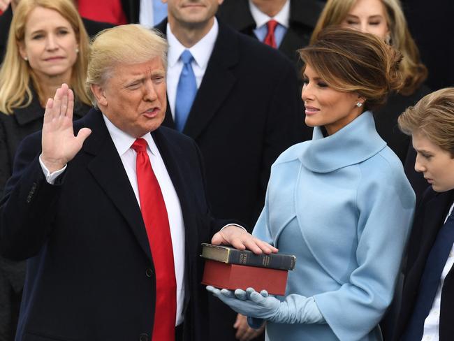 He’s known for wearing red, a power colour, as seen here during his 2017 presidential ceremony. Picture: Mark Ralston / AFP