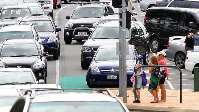 Traffic chaos at Benowa State School as parents pick up their children.