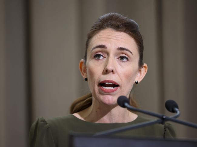 WELLINGTON, NEW ZEALAND - DECEMBER 08: Prime Minister Jacinda Ardern speaks to media during a media lock-up ahead of the release of the Royal Commission of Inquiry in relation to the Terrorist Attack on Christchurch Mosques at Parliament on December 08, 2020 in Wellington, New Zealand. The Royal Commission report into the 2019 terrorist attack on Christchurch mosques will be released on Tuesday 8 December.  51 people were killed after a man opened fire at Al Noor Mosque and the Linwood Islamic Centre in Christchurch on Friday, 15 March 2019. The Australian gunman was sentenced to life in prison without parole after being found guilty of 92 charges relating to what was New Zealand's worst mass shooting in history. (Photo by Hagen Hopkins/Getty Images)