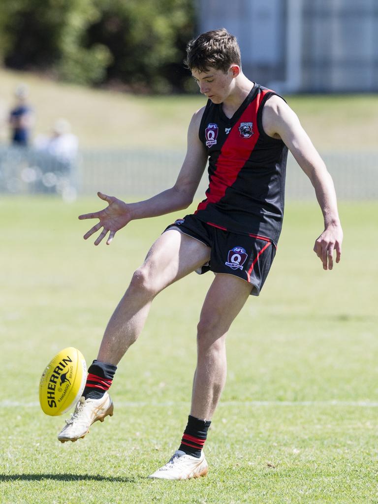 Jack Barwick kicks for South Toowoomba Bombers against Coolaroo in U14 AFL Darling Downs grand final at Rockville Park, Saturday, September 2, 2023. Picture: Kevin Farmer