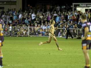 SENTENCED: Anthony Ryan Blair, 20, walks from the Toowoomba Magistrates Court yesterday after pleading guilty to streaking on the field at the Brisbane Broncos v Gold Coast Titans NRL pre-season trial at Clive Berghofer Stadium. Picture: Kevin Farmer