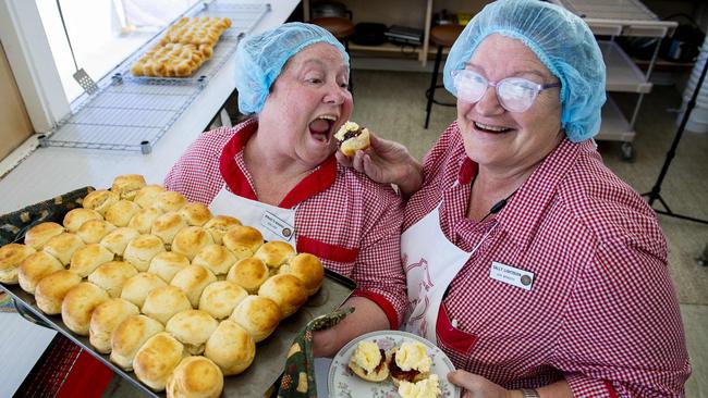 CWA ladies Bernadette McNamara from Edwardstown and Sally Lightburn from Murray Town in the Flinders Ranges celebrate baking the last batch of over 12500 scones in the CWA kitchen during the last day of the Royal Show Sunday,September,10,2023.Picture Mark Brake