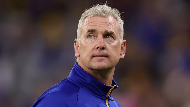 PERTH, AUSTRALIA - AUGUST 26: Adam Simpson, head coach of the Eagles walks from the field following the quarter time break during the round 24 AFL match between the West Coast Eagles and Adelaide Crows at Optus Stadium, on August 26, 2023, in Perth, Australia. (Photo by Paul Kane/Getty Images)