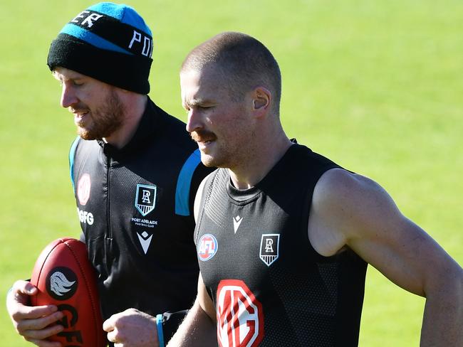 Tom Jonas of Port Adelaide and Tom Clurey of Port Adelaide during the open Port Adelaide training session at Alberton Oval Wednesday,July,13,2022.Picture Mark Brake