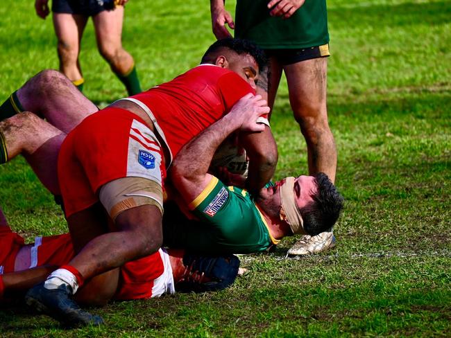 South Grafton centre Thomas McGrady tackles Orara's Ryan Gill. Photo: Orara Valley Axemen