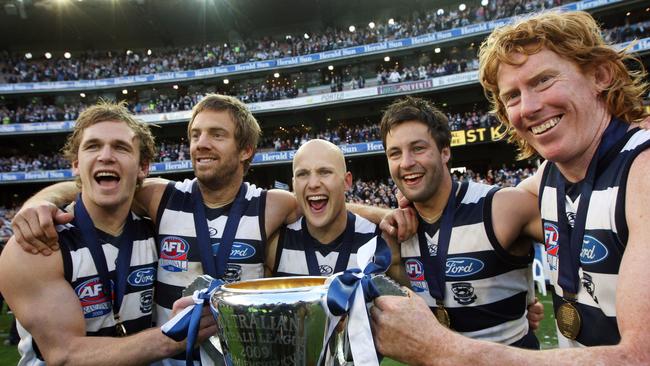 Joel Selwood, Joel Corey, Gary Ablett Jr, Jimmy Bartel and Cameron Ling with the 2009 premiership cup.