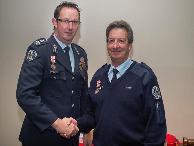 Portland Fire Brigade volunteer Garry Mallen (right) died on the job.