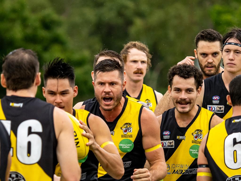 Nightcliff warm up before their Round 17 clash with PINT in Men's Premier League. Picture: AFLNT Media / David Bradley.