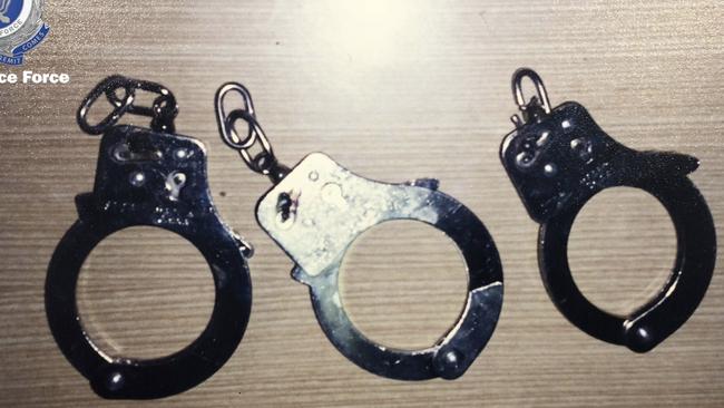 Handcuffs used to tie up the pilot and airport workers to a fence while the robbers rifled through the plane looking for cash. Picture: NSW Police.