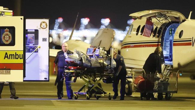 One of the injured is flown from the coal mine by the Royal Flying Doctors Service to Brisbane.