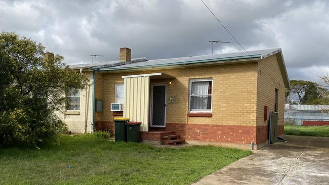 The alleged kidnapping victim was found in the boot of a car at this Elizabeth Park home. Picture: Gabriel Polychronis