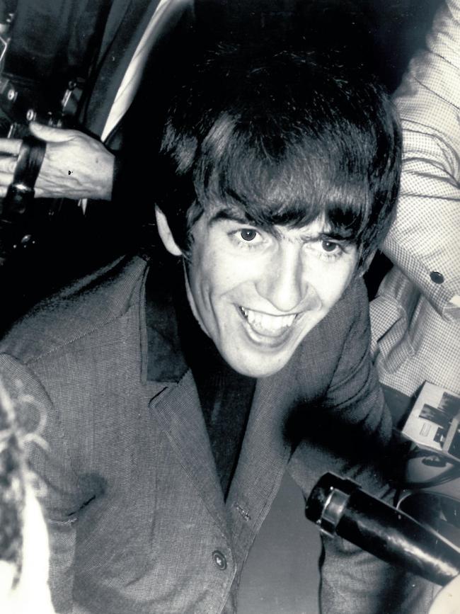 George Harrison from the Beatles lands in Australia in 1964. Picture: News Corp