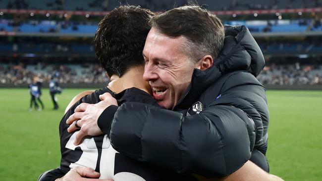 MELBOURNE, AUSTRALIA - AUGUST 17: Nick Daicos (left) and Craig McRae, Senior Coach of the Magpies celebrate during the 2024 AFL Round 23 match between the Collingwood Magpies and the Brisbane Lions at The Melbourne Cricket Ground on August 17, 2024 in Melbourne, Australia. (Photo by Michael Willson/AFL Photos via Getty Images)