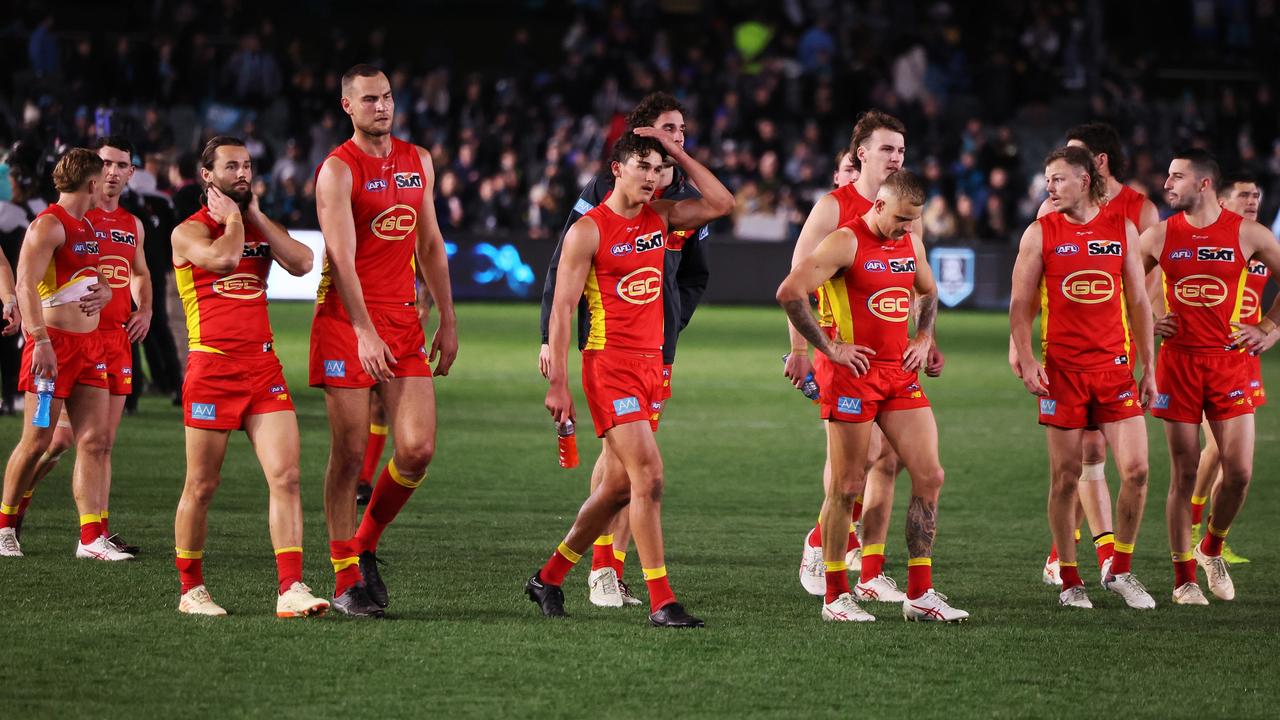 ADELAIDE, AUSTRALIA - JULY 08: The Suns after their loss during the 2023 AFL Round 17 match between the Port Adelaide Power and the Gold Coast Suns at Adelaide Oval on July 8, 2023 in Adelaide, Australia. (Photo by James Elsby/AFL Photos via Getty Images)