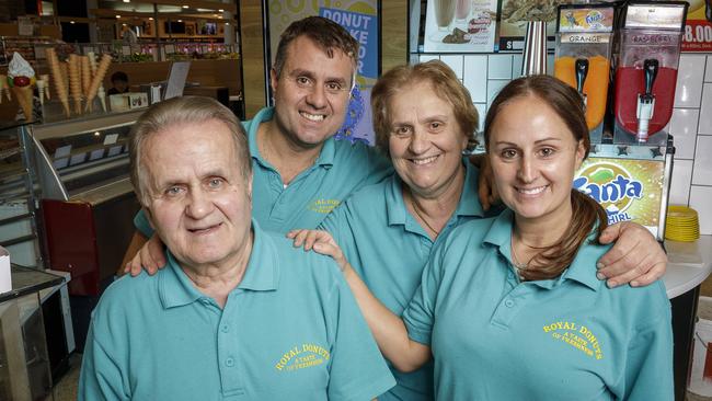 Con, John, Roula and Vanessa from Royal Donuts, arguably Knox City’s most beloved business. The store, famous for its cinnamon doughnuts and doughnut birthday cakes, has been at the centre since day one. Photo: Daniel Pockett