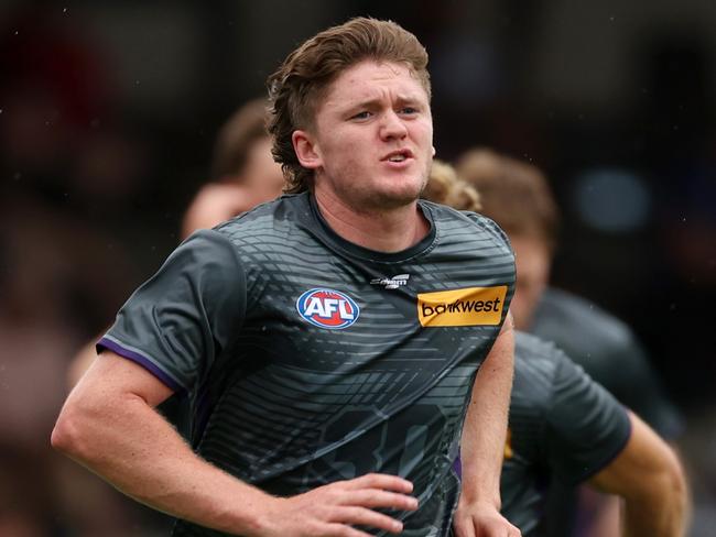 PERTH, AUSTRALIA - FEBRUARY 24: Nathan O'Driscoll of the Dockers warms up before an AFL practice match between West Coast Eagles and Fremantle Dockers at Mineral Resources Park on February 24, 2024 in Perth, Australia. (Photo by Will Russell/Getty Images)